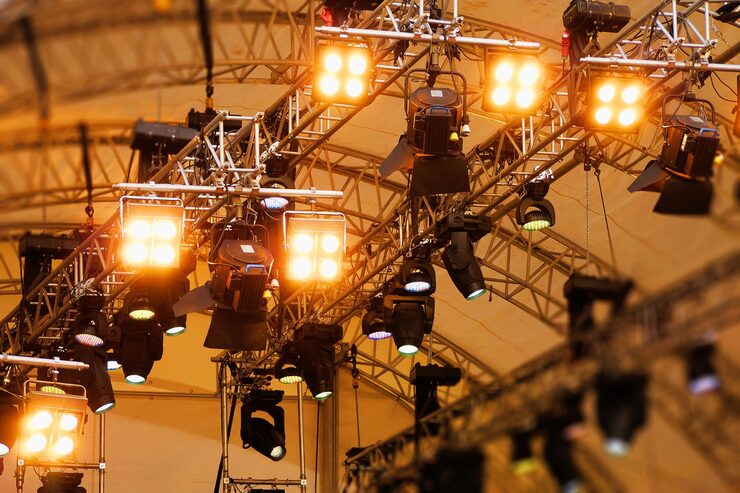 low-angle-view-illuminated-stage-lights-night_1048944-23218398
